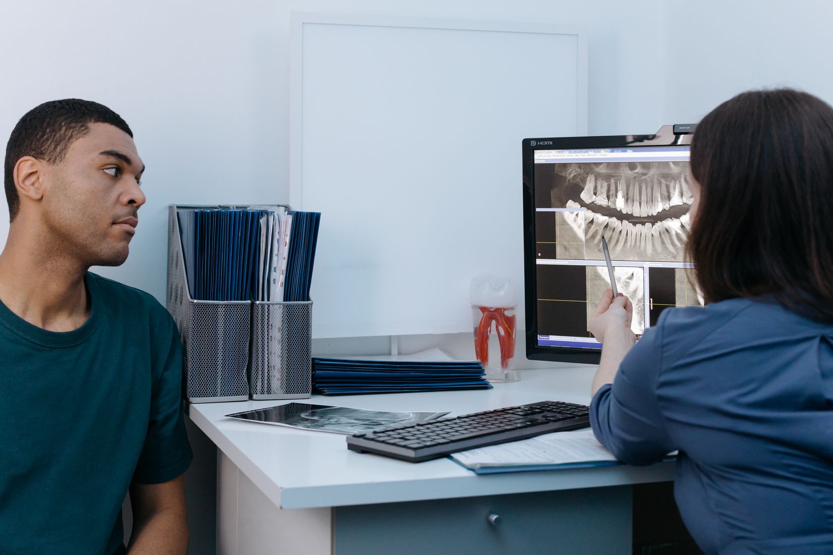 Dental X ray consultation and treatment planning

A dentist reviews a dental X ray with a patient during a treatment planning consultation.